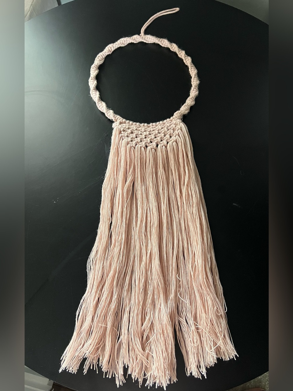 Light pink macrame wall hanging